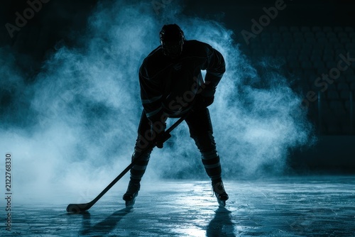 Moody ice hockey scene: lone player silhouette in full gear with blue glow