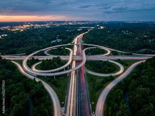 Aerial view of a busy highway interchange at twilight