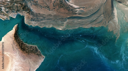 View of coastline and water from above showing land and sea details in a unique arrangement