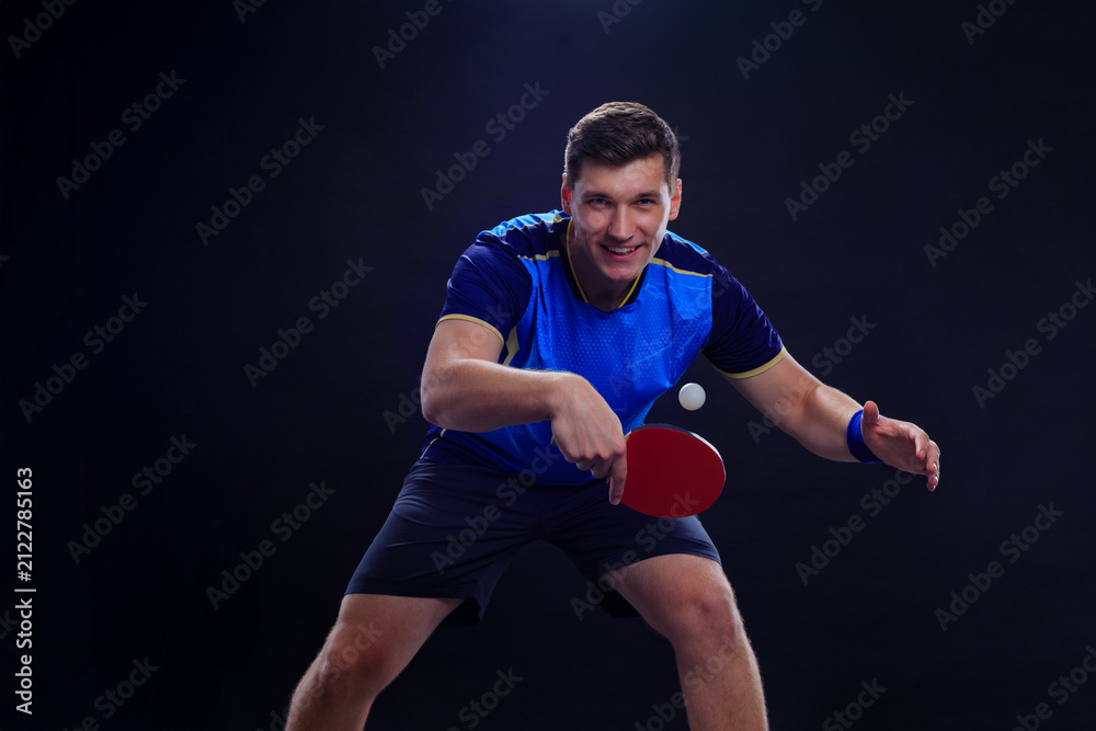 Fototapeta premium Table tennis player. Ping pong player in action