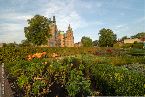Morning glow painting Rosenborg’s towers with soft golden Scandinavian radiance