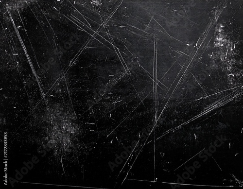 dark grunge texture background with heavy white scratches and dust particles ideal for film overlays vintage photography effects retro designs and creative digital projects