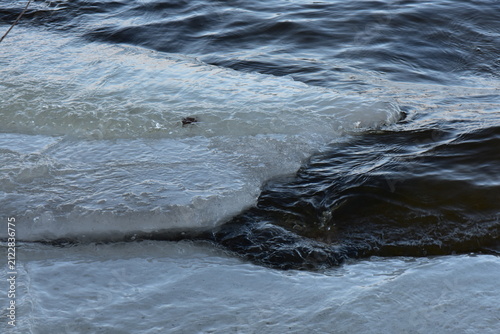 Bild auf Leinwand Ice hummocks on the river in winter, closeup of photo