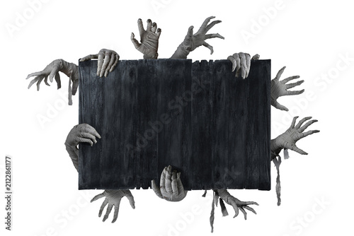Mummy's hands wrapped in a bandage on copy space wooden background. The hand of the risen dead mummy monster for Halloween horror concept.