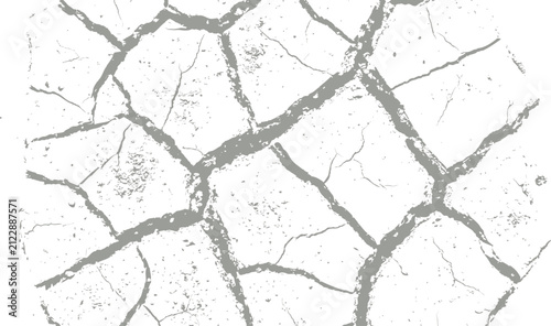 Cracked dry earth texture with rough surface during drought and arid conditions