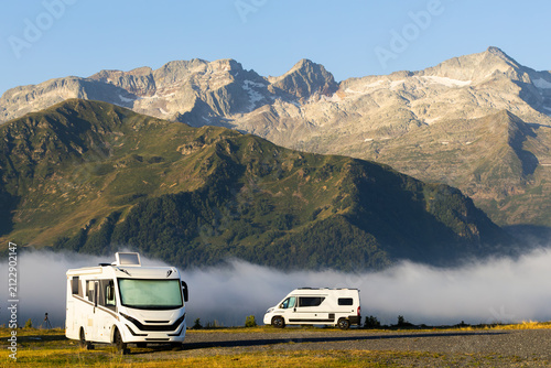 Motorhomes camping Pyrenees mountains sunrise Superbagneres France