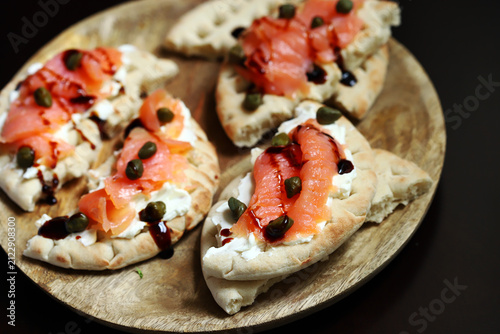 Pita with salmon and capers
