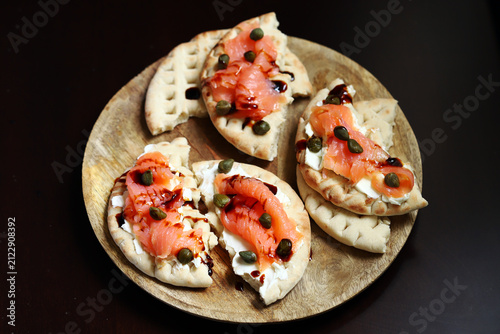 Pita with salmon and capers