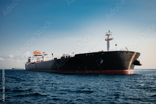 Large Oil Tanker Ship Anchored at Sea Under Clear Blue Sky