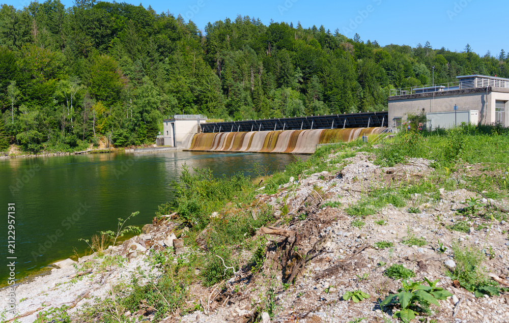 Fototapeta premium Hydroelectric Power Station with Water Overflowing in Bavaria Germany