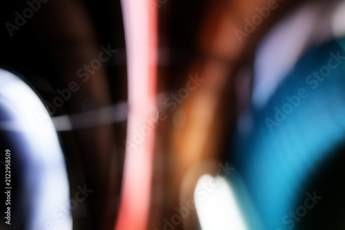 фотографія Abstract dark background, glowing red line and textured blue light for tech crea