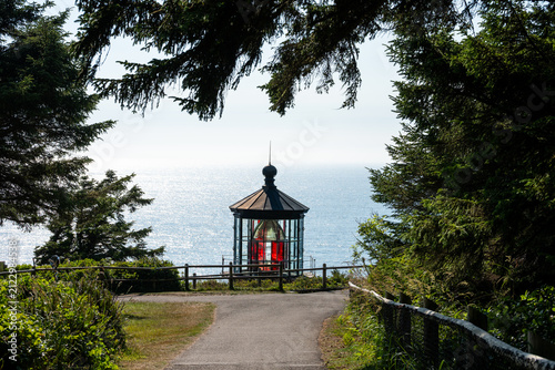 Canvastavla Trail through woodland forest to lighthouse on headland at Cape Meares National