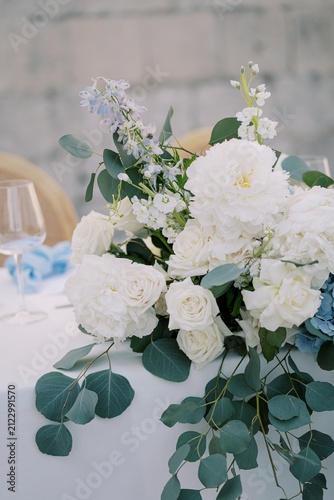 Fotografie Elegant white peonies and roses wedding floral arrangement