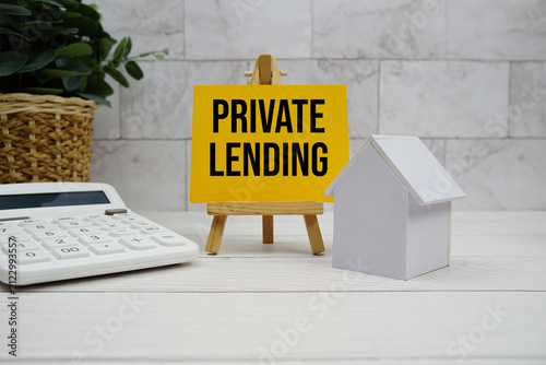 Private Lending text with house model and calculator on wooden background