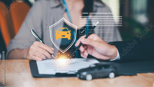 Fotografie Insurance consultant reviews car insurance, policy agreement, coverage protection, insurance contract, claim process, financial protection, and risk management with clients before policy approval