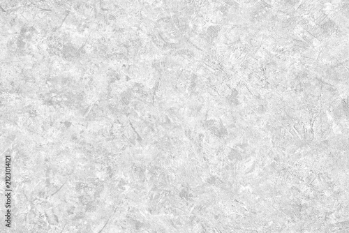 Фотография Abstract light grey plastered textured grunge background in the form of a rough