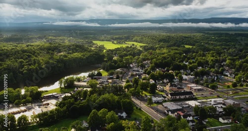 Shawangunk, NY, USA - July 29, 2026. Aerial video of the Hamlet of Wallkill in the Town of Shawangunk NY, Ulster County, on a partly cloudy summer afternoon.	
