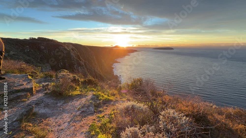 Spectacular sunrise over the Waitpinga cliffs and ocean in South Australia in 4k footage