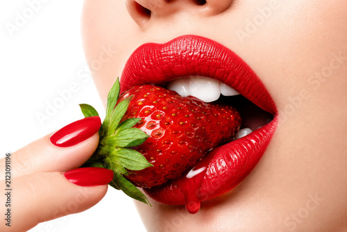 Captivating Red Lips Gently Nibbling a Juicy Strawberry Symbolizing Sensual Indulgence and Sweet Temptation in a Vivid High-Definition Presentation for Romantic Themes