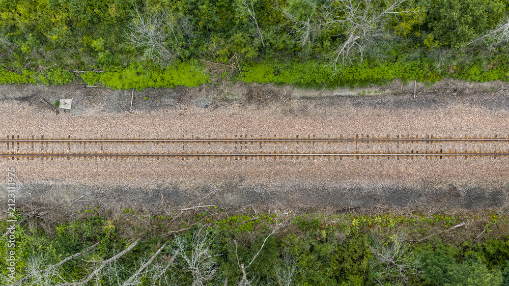 Fototapeta premium An aerial perspective looking straight down at a railroad track.