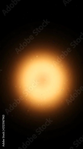 Glowing orange sun orb on black background