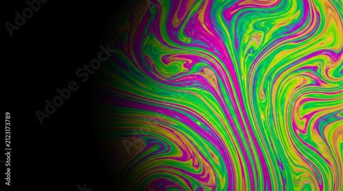 Swirling Colorful Oil on Water Rainbow Spectrum Pattern