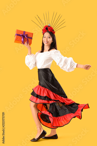 Young Asian woman dressed f...