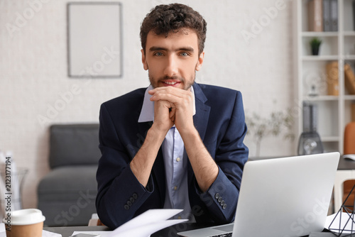 Young businessman working a...