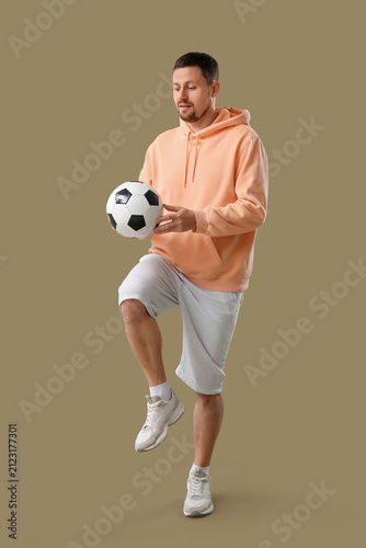 Man playing with soccer bal...