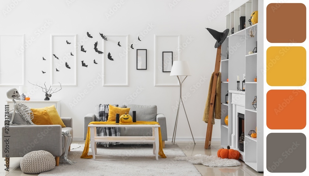 Obraz premium Halloween decorated modern living room with skeleton and pumpkins