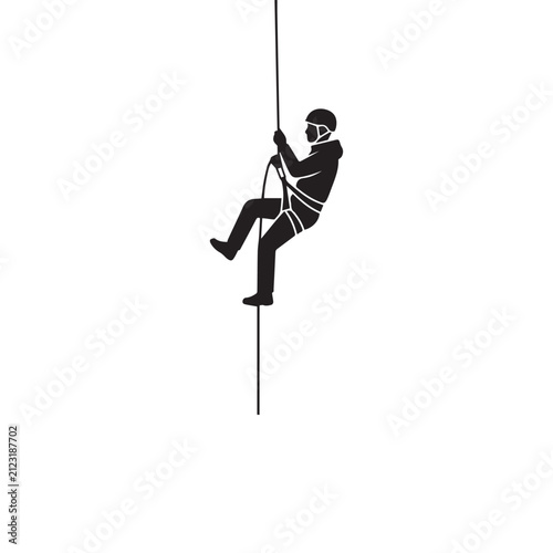 Obraz na płótnie Silhouette of climber rappelling or abseiling down rope vector illustration