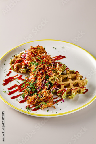Canvas Print Green zucchini waffles with pulled pork, vibrant cabbage slaw and barbecue sauce