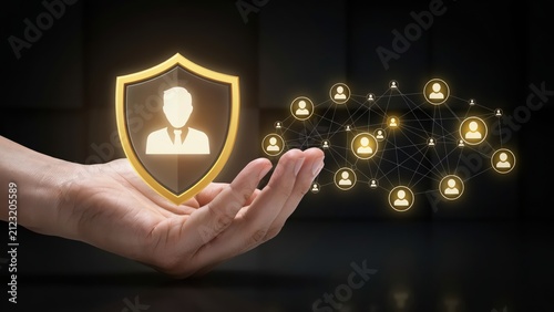 Cyber security and identity protection concept with hand holding a shield icon and social network connection on dark background.