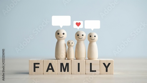 Peg doll family on block with speech bubble