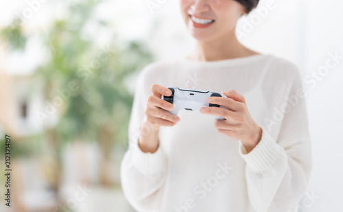 Foto ゲームをする女性