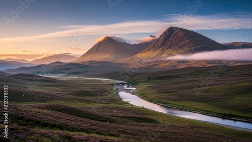 Mountainous landscape with winding river and heather hills at dawn