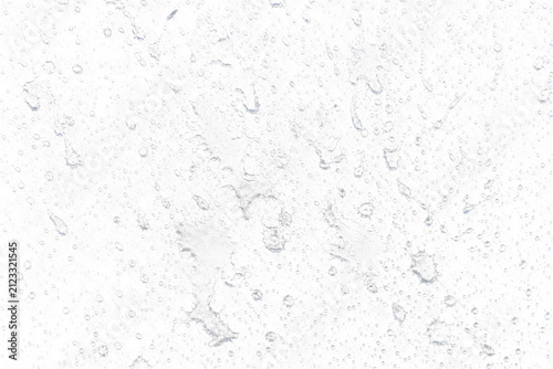 Broad natural glancing water strike on glass isolated