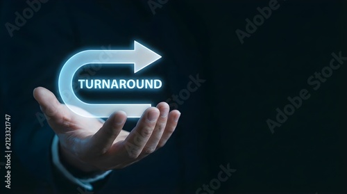 Business professional presenting digital turnaround strategy concept with glowing arrow icon floating above open palm