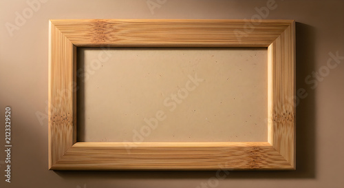 Fototapeta Empty rectangular frame embedded in a beige wall surface