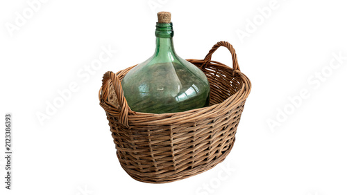 Fotografía Old vintage glass carboy bottle inside wicker basket isolated on transparent bac