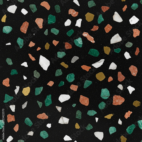 Terrazzo pattern with black background and colorful chips