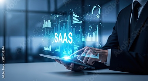 Business Professional Interacting With SAAS Technology Interface On Tablet.