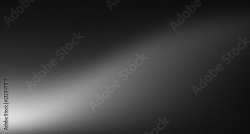 Bild auf Leinwand Single beam of light illuminating a dark background with subtle texture and grad