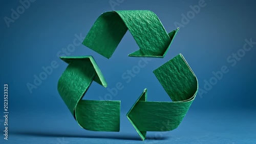 Green Recycling Symbol Icon Against A Blue Background Studio Lighting Environment