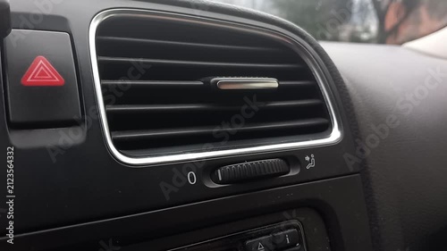Central car heater fan whirring quickly while engine idles, capturing sounds of airflow inside a vehicle