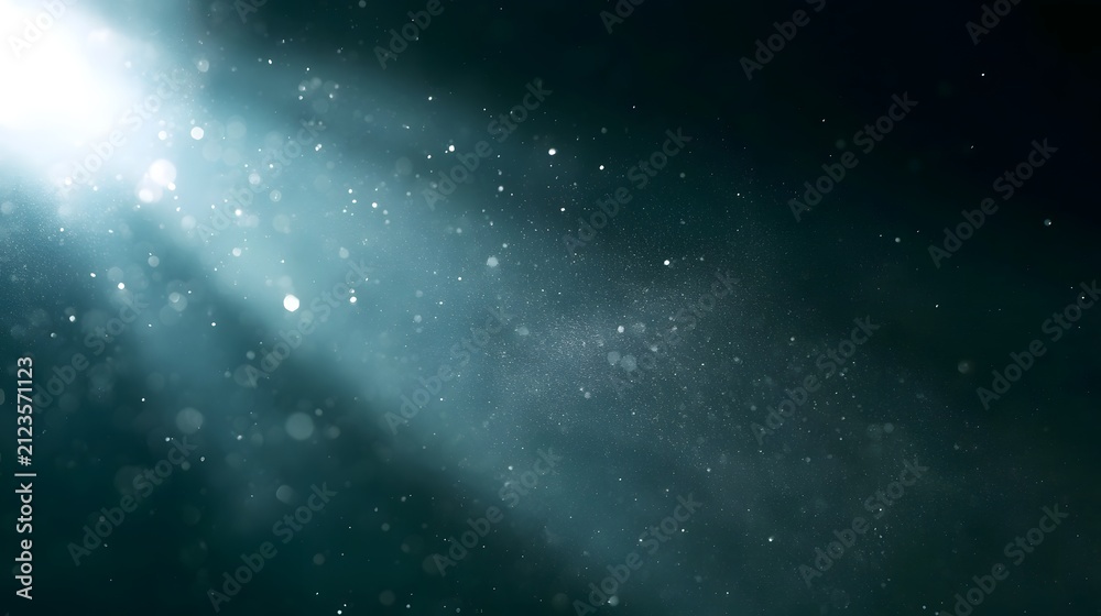 Obraz premium A radiant beam of light illuminates suspended particles against a dark background creating an ethereal and serene atmosphere