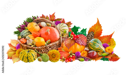 фотографія Autumn and natural decorations with chestnuts, pumpkins, leaves and flowers isol