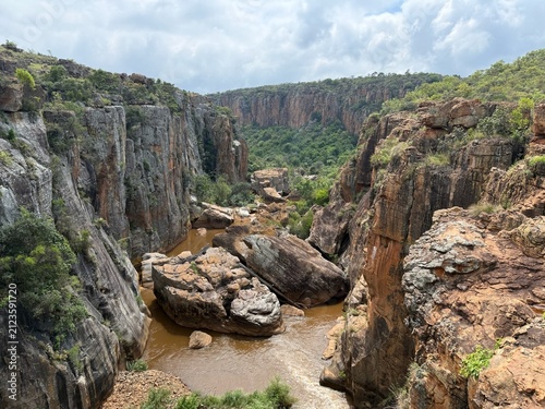 Canvas Print Bourke's Luck Potholes canyon with rocky cliffs and the Blyde river near Graskop