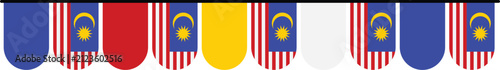 Fotografía Decorative bunting flags featuring the national flag of Malaysia hanging in a row