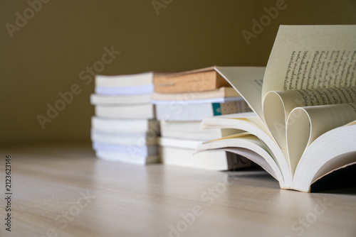 Photography Open Book with Heart Shaped Pages on Wooden Desk in Soft Natural Light for Educa